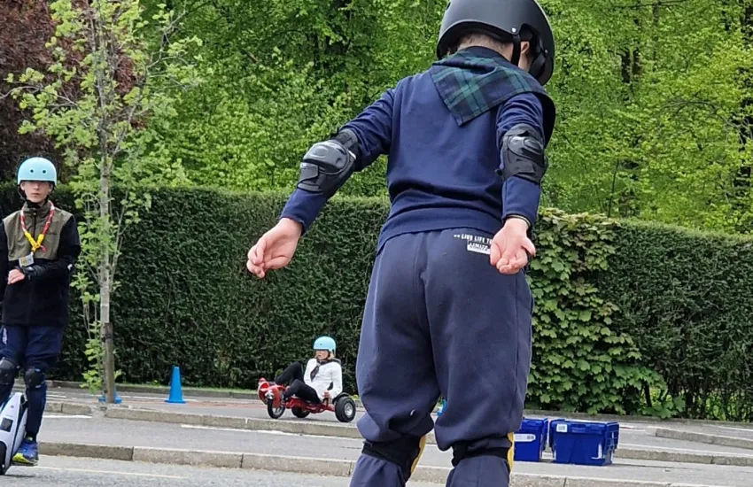 male scout on a hover board 