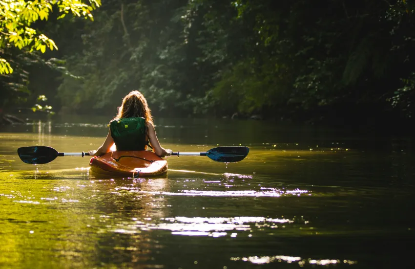 a female in a kayak