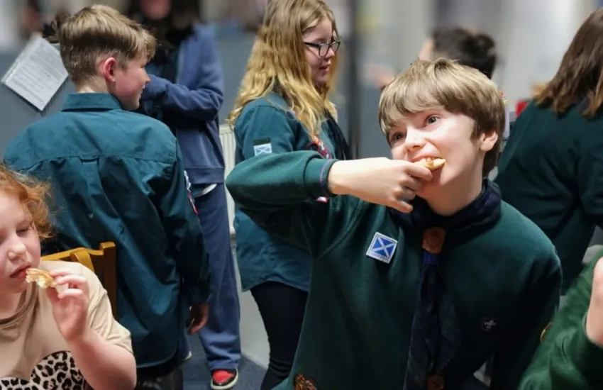 Cubs and scouts making pancakes