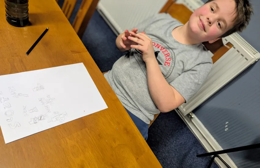 A cub making a poster