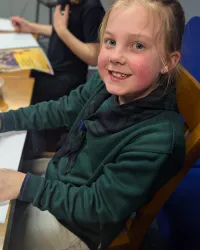 A cub making a poster