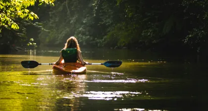 a female in a kayak