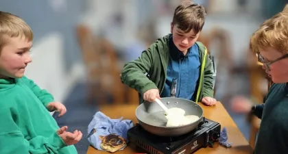 Cubs and scouts making pancakes
